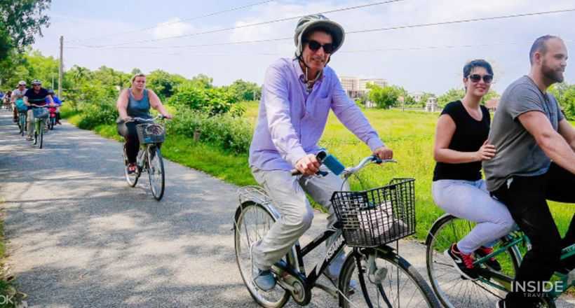 Discover Thuy Bieu Eco-Village by bicycle and boat